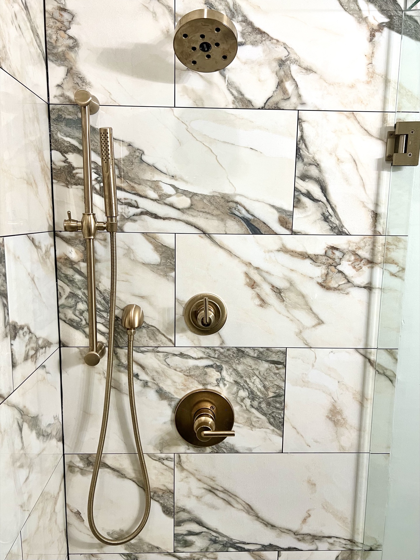Shower detail, brass fixtures, 940 Interiors