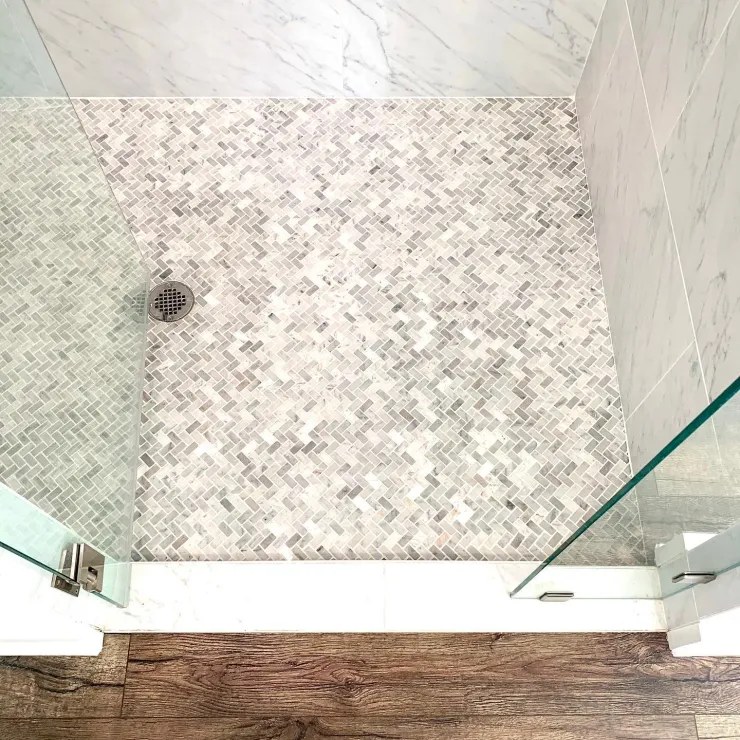 Old Gin bathroom — herringbone mosaic tile shower floor detail