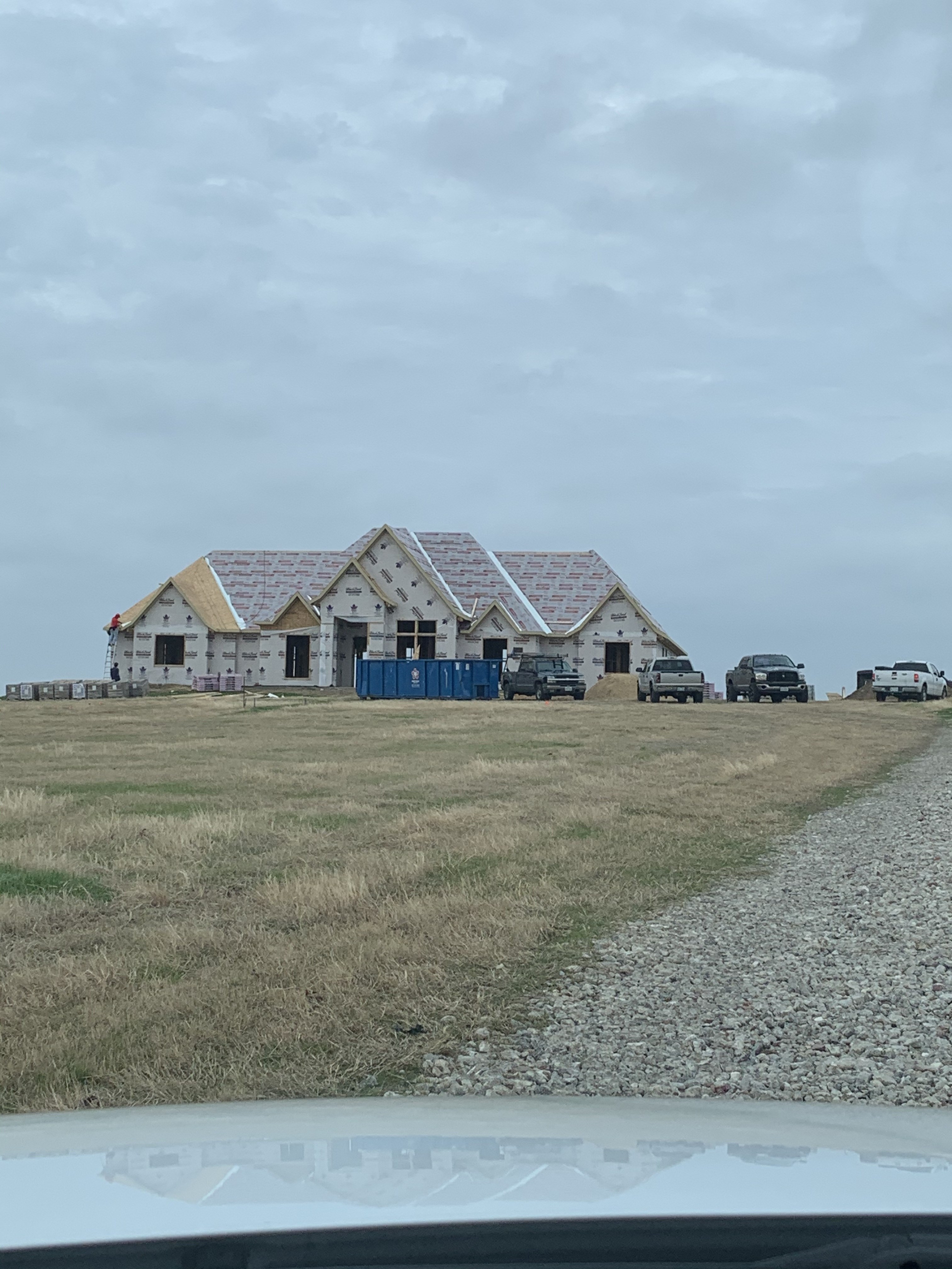 Old Gin new build — exterior framing on open land