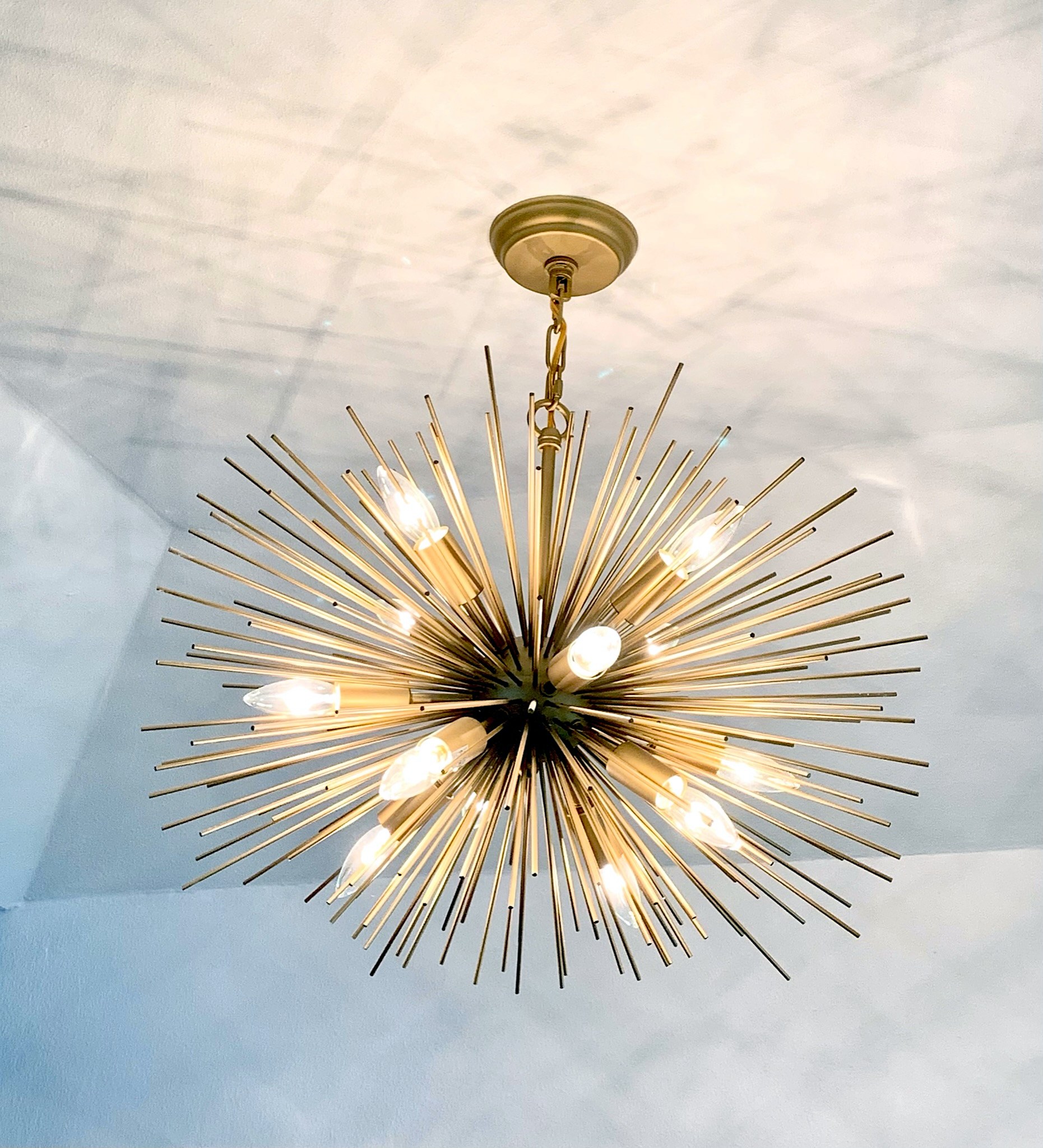 Summer Glen renovation — gold starburst light fixture