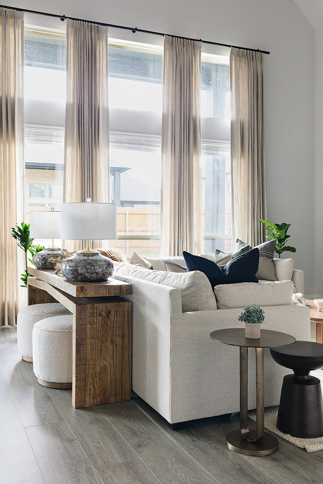 Strait Lane living room — windows, sofa grouping and fireplace