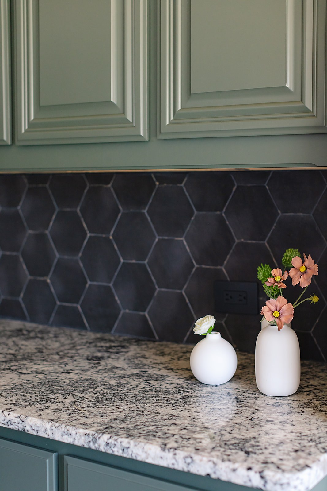 Strait Lane kitchen — range hood, open shelving and green cabinetry