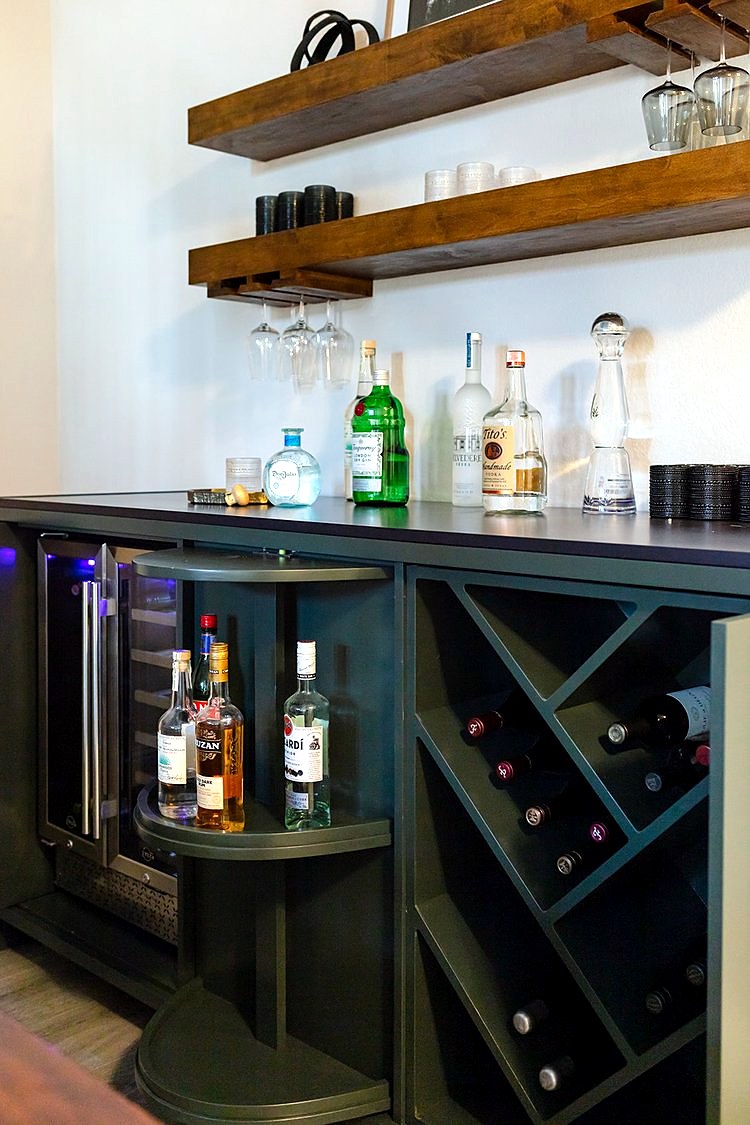 Strait Lane — bar detail with wine cooler and warm wood tones