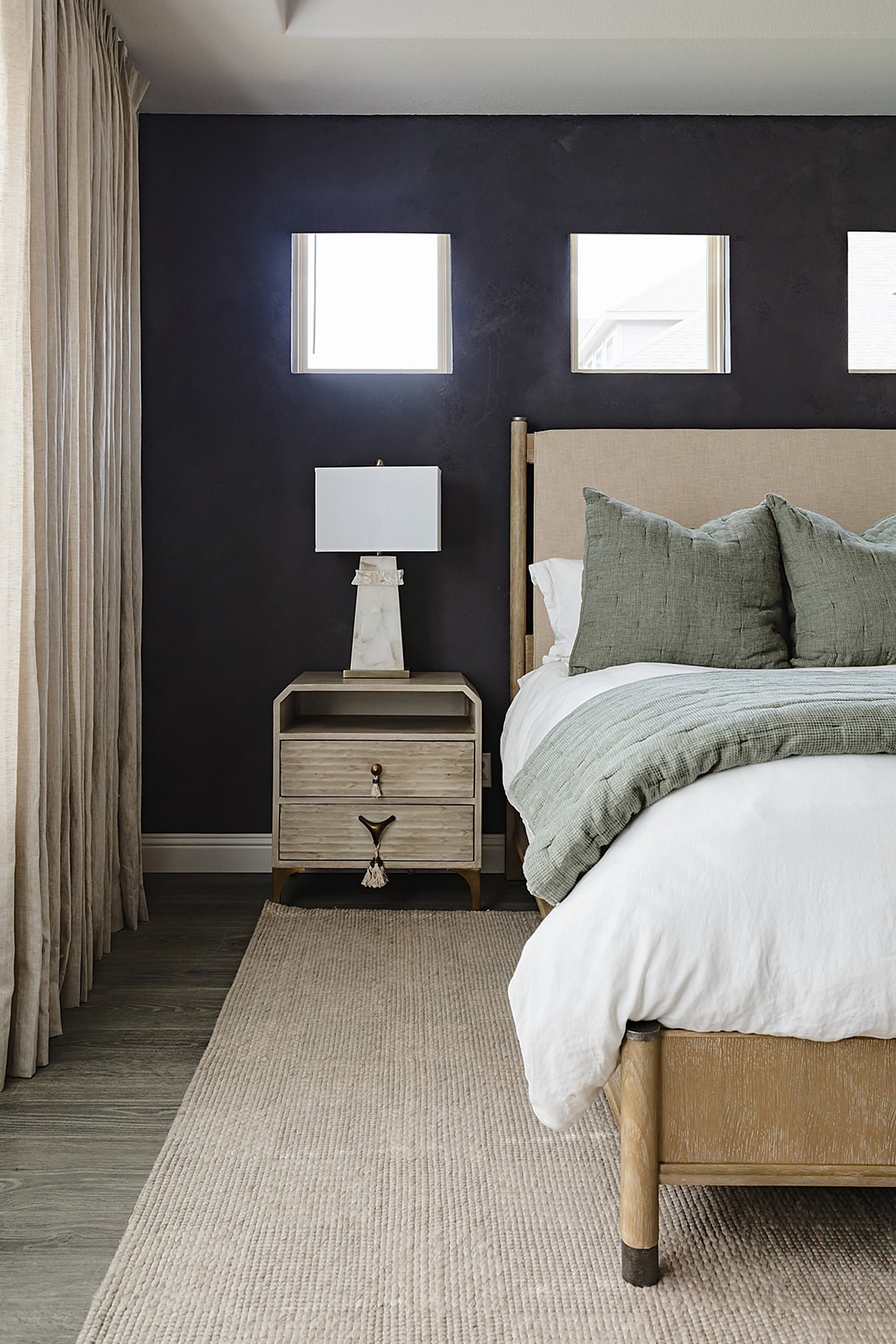 Strait Lane primary bedroom — modern rustic styling with white lamps