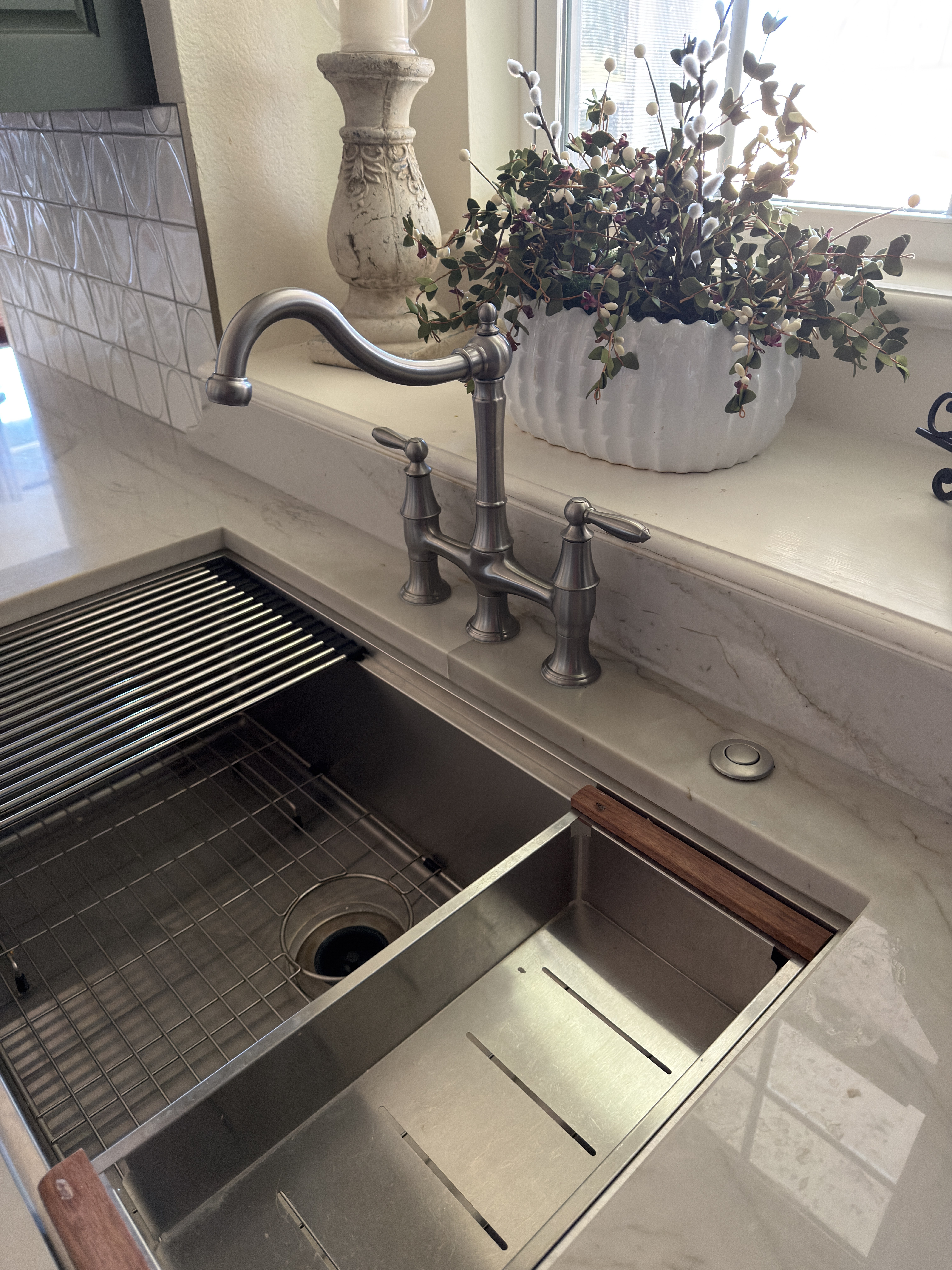 Sugar Ridge kitchen — workstation sink with bridge faucet, marble countertop, eucalyptus