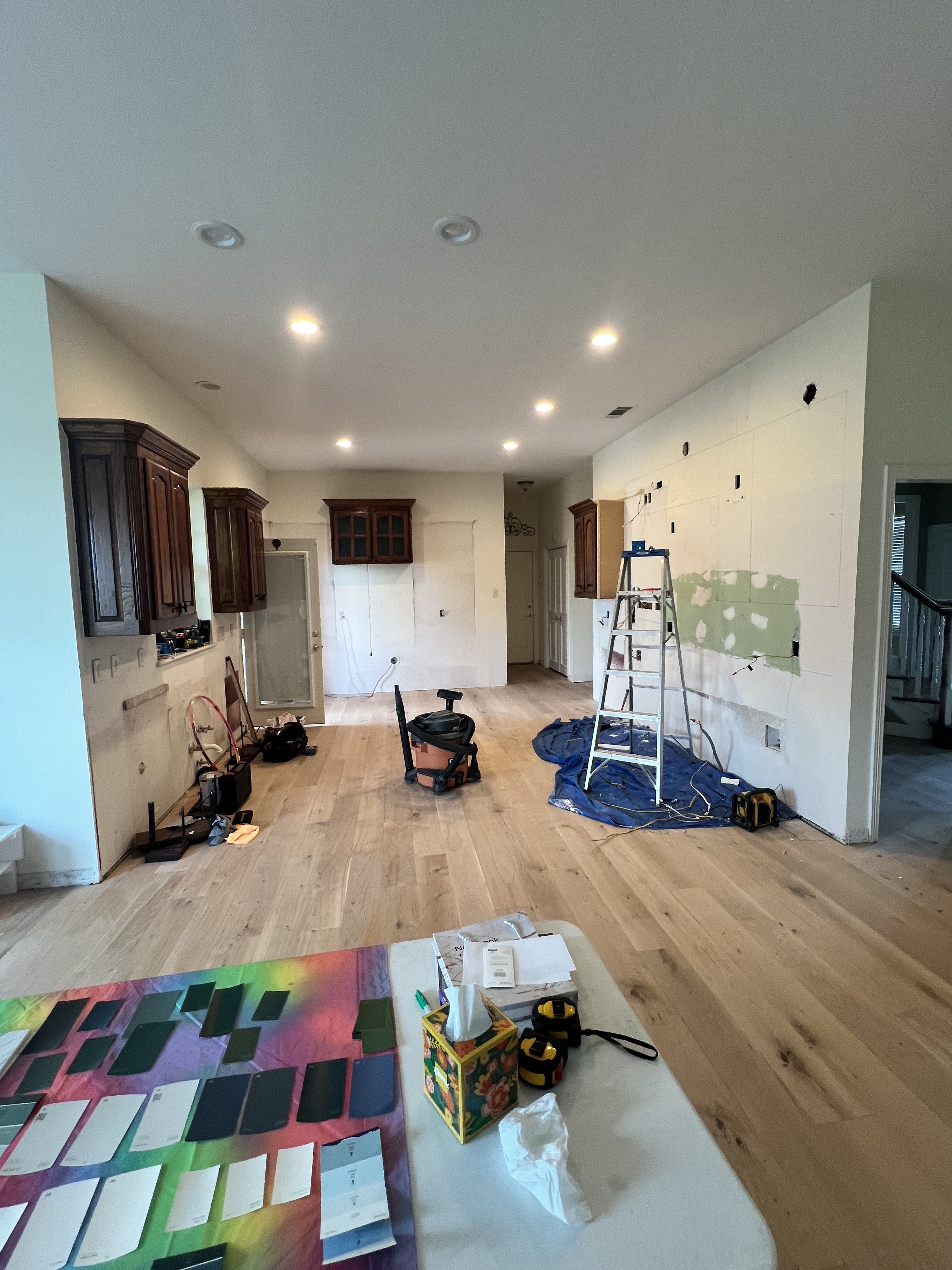 Sugar Ridge kitchen before renovation — mid-construction, dark cabinetry removed